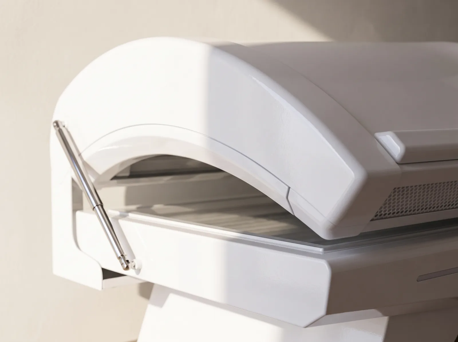 Close detail of the seam where the canopy meets the base, the gas strut at the hinge.