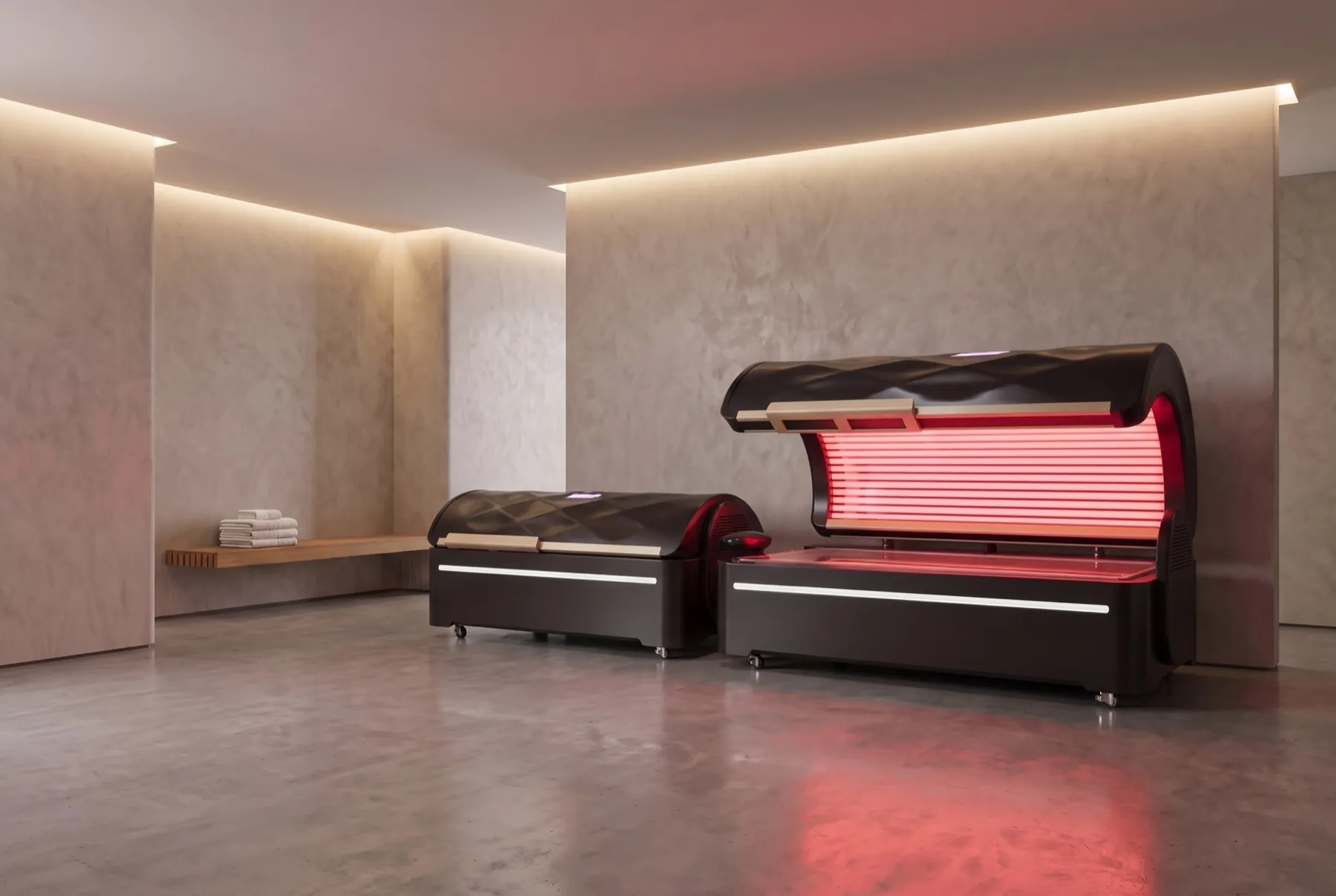 Two Commercial Beds on an open studio floor, one lit and one closed.
