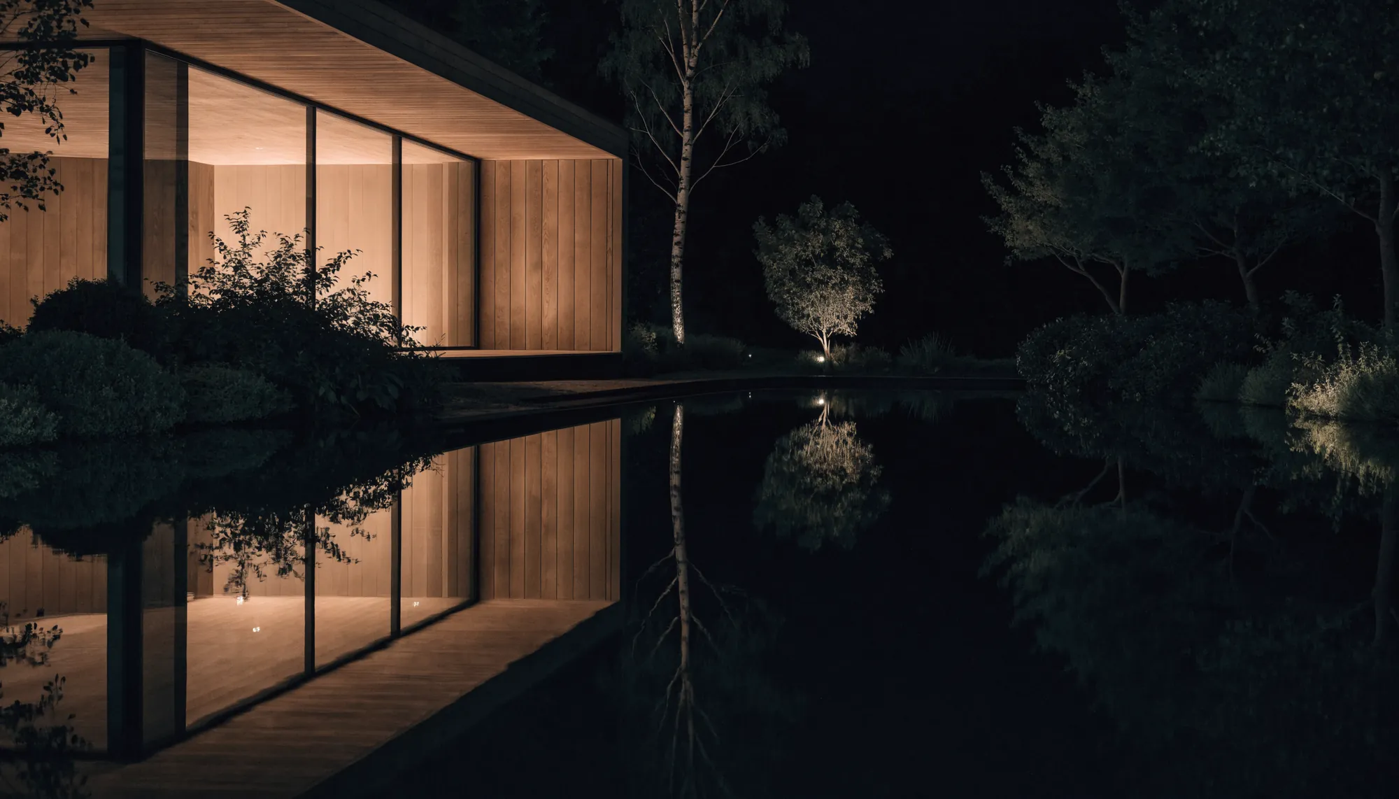 A timber sauna beside a still lap pool at night